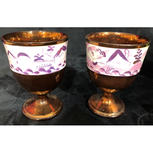 8120 - A pair of Sunderland lustre goblets (1 cracked) and a Japanese coffee service on green ground with g... 