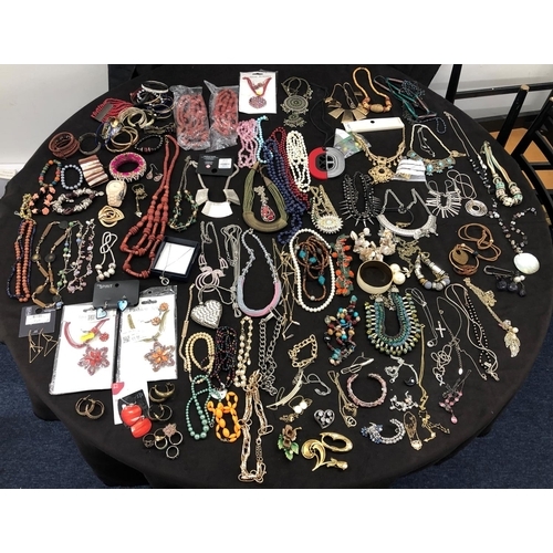 8066 - A large quantity of various costume jewellery, necklaces, bracelets, earrings, cufflinks etc.