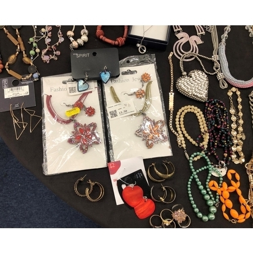 8066 - A large quantity of various costume jewellery, necklaces, bracelets, earrings, cufflinks etc.