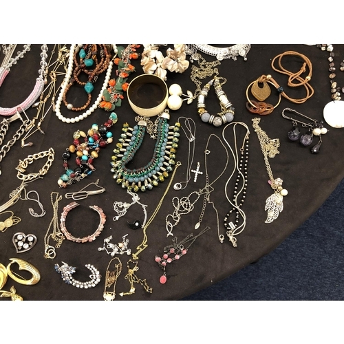 8066 - A large quantity of various costume jewellery, necklaces, bracelets, earrings, cufflinks etc.