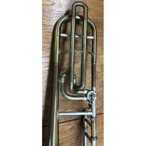 8278 - A brass trombone, (missing valves and mouthpiece), marked LP 350938 and etched ILEA to side, 119cm l... 