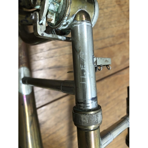 8278 - A brass trombone, (missing valves and mouthpiece), marked LP 350938 and etched ILEA to side, 119cm l... 