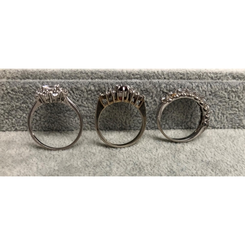 8309 - 3 silver coloured metal dress rings.