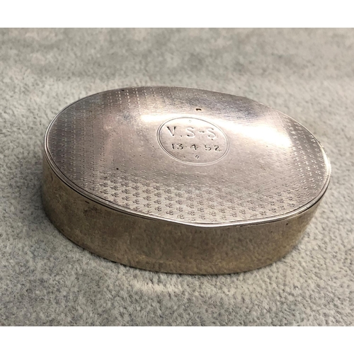 8313 - An oval silver box with engine turn decoration and inscribed to top, 6.5cm wide ( dent to 1edge of b... 