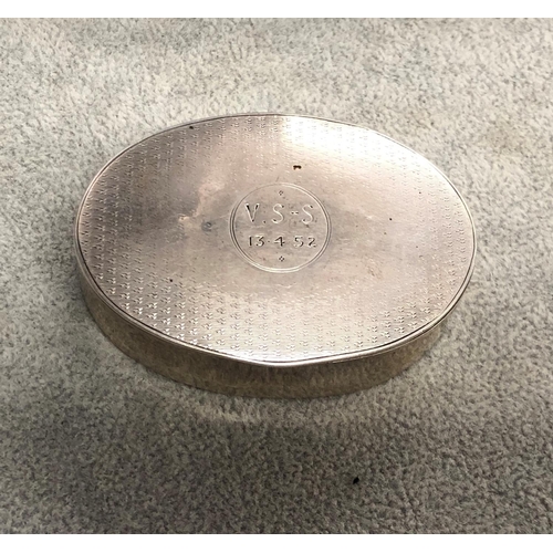 8313 - An oval silver box with engine turn decoration and inscribed to top, 6.5cm wide ( dent to 1edge of b... 