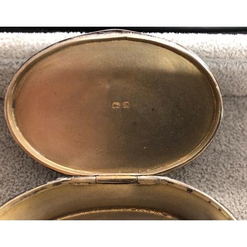 8313 - An oval silver box with engine turn decoration and inscribed to top, 6.5cm wide ( dent to 1edge of b... 