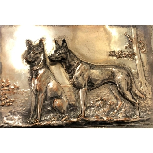 8303 - A copper plaque of 2 German shepherd dogs, F. Diller and numbers stamped to base, on wood plate, 21.... 