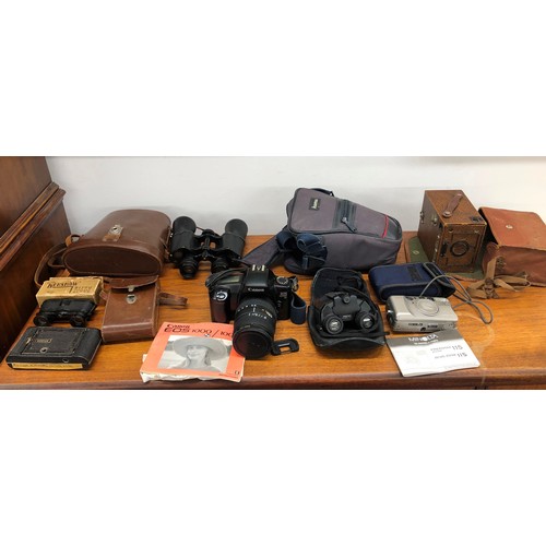 8329 - An Eastman Kodak Company camera with brown leather case, an Ensign box camera with canvas case, a Ca... 