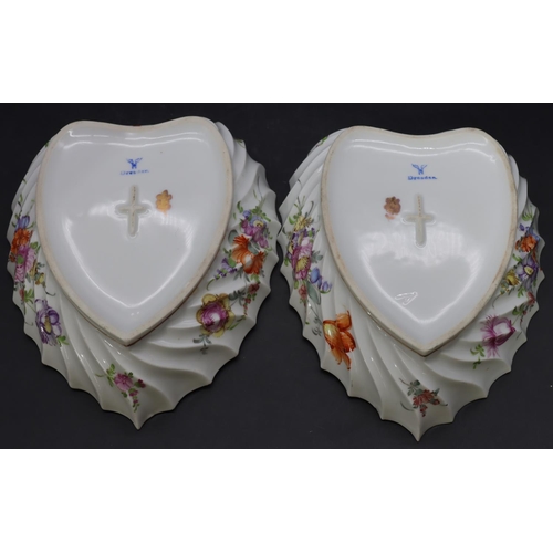 10 - A pair of 20th Century Dresden heart shaped dishes with scallop shaped rims, on white ground with mu... 