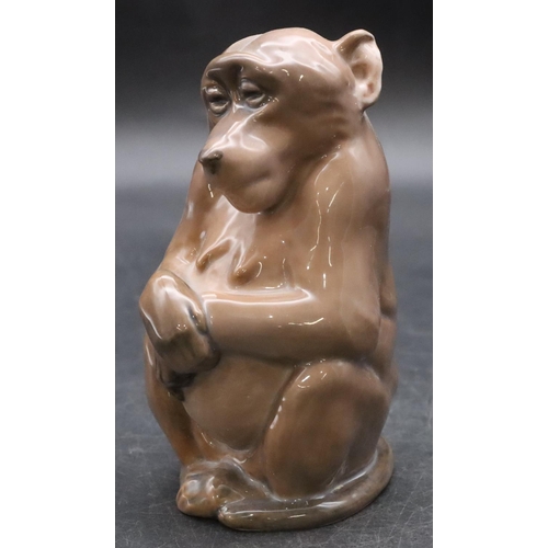 100 - A Royal Copenhagen figure of a seated monkey, number 1444, 13cm high