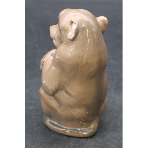 100 - A Royal Copenhagen figure of a seated monkey, number 1444, 13cm high