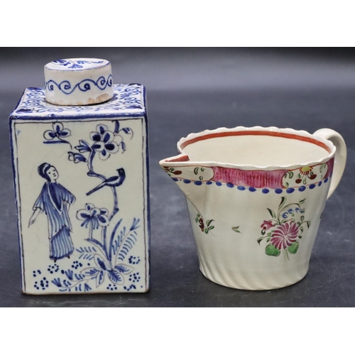 108 - A 19th Century Delft square tea caddy with cover and figure, bird and floral decoration, 11cm high a... 