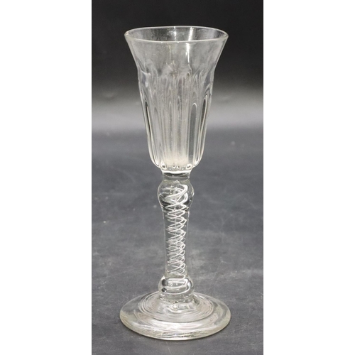 109 - A 19th Century round cordial glass with inner twist stem, sweeping round foot, 16.8cm high