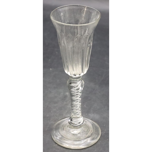 109 - A 19th Century round cordial glass with inner twist stem, sweeping round foot, 16.8cm high