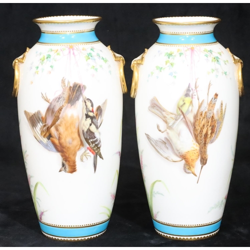 112 - A pair of Minton round bulbous thin necked trumpet shaped vases on white and turquoise ground with m... 