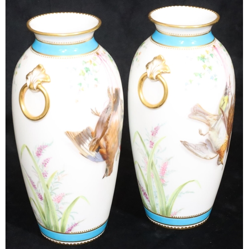 112 - A pair of Minton round bulbous thin necked trumpet shaped vases on white and turquoise ground with m... 