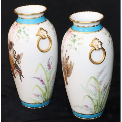 112 - A pair of Minton round bulbous thin necked trumpet shaped vases on white and turquoise ground with m... 