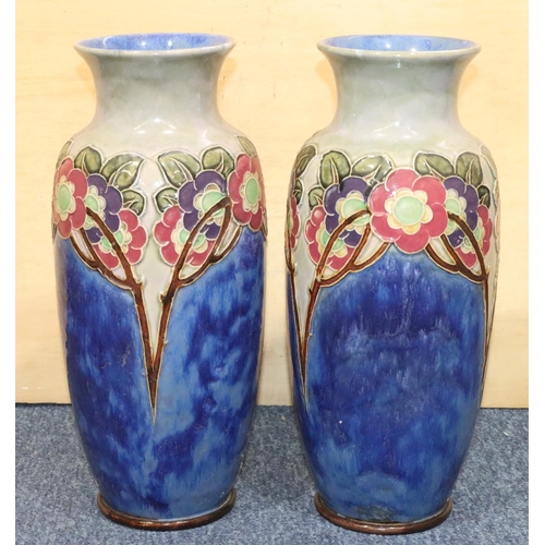 121 - A large pair of Royal Doulton glazed earthenware round bulbous thin necked trumpet shaped vases on b... 