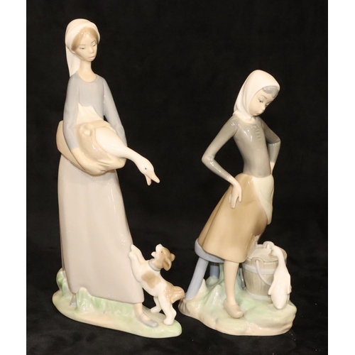 147 - 2 Lladro figures of a lady holding a goose with puppy at her feet, 27.5cm high and a standing lady w... 