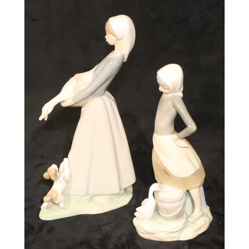 147 - 2 Lladro figures of a lady holding a goose with puppy at her feet, 27.5cm high and a standing lady w... 