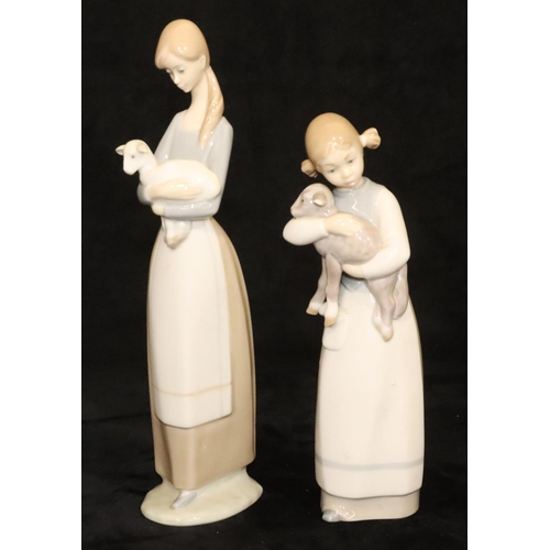 148 - 2 Lladro figurines of a young standing girl holding a lamb, 22cm high and a standing lady holding a ... 