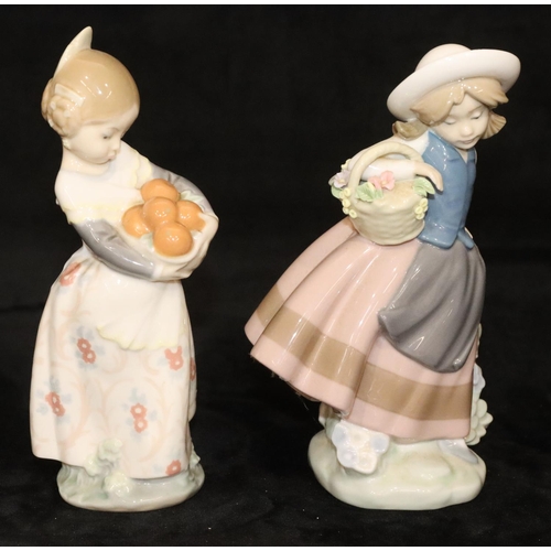 149 - 2 small Lladro figures of young girls holding a basket of encrusted flowers and a basket of fruit, 1... 