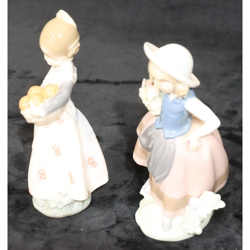 149 - 2 small Lladro figures of young girls holding a basket of encrusted flowers and a basket of fruit, 1... 