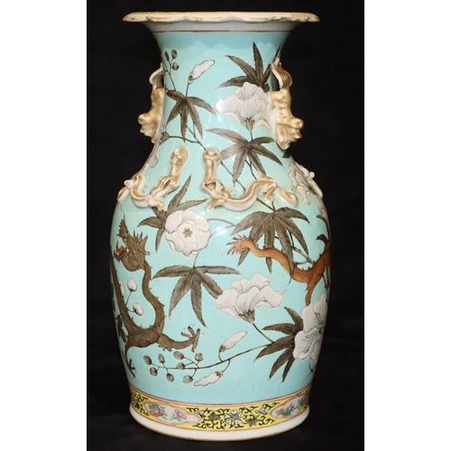 15 - A 19th Century Chinese round bulbous thin necked trumpet shaped vase on white and turquoise ground w... 