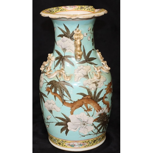 15 - A 19th Century Chinese round bulbous thin necked trumpet shaped vase on white and turquoise ground w... 