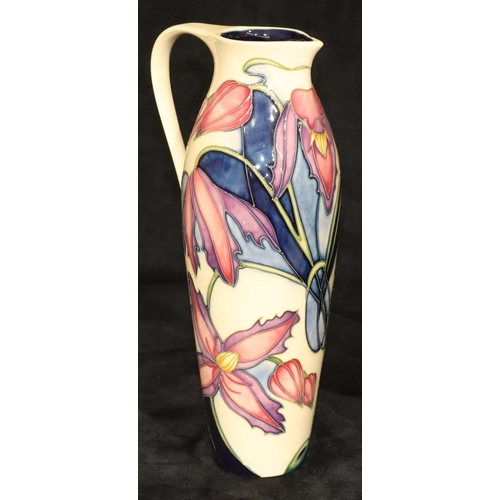 164 - A modern Moorcroft tall cylindrical jug on cream ground with multi-coloured floral and leaf decorati... 