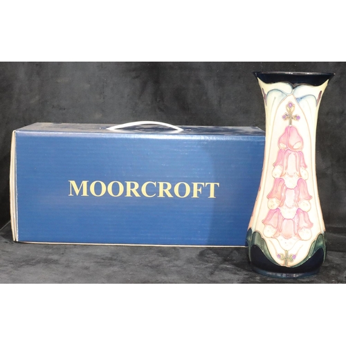 166 - A modern Moorcroft round bulbous trumpet shaped vase on cream, pink and blue ground, 31cm high (boxe... 