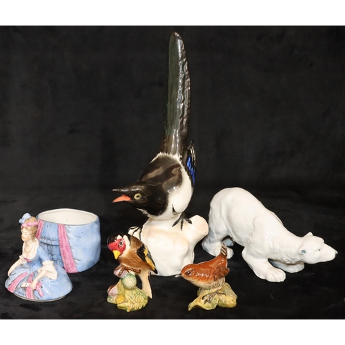 17 - A Russian china figure of a perched bird, 25cm high, 2 Beswick figures of perched birds, a china fig... 