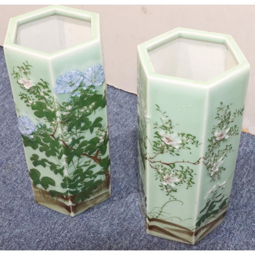 178 - A pair of Oriental hexagonal glazed vases on pale green ground with multi-coloured floral, branch an... 