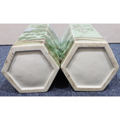 178 - A pair of Oriental hexagonal glazed vases on pale green ground with multi-coloured floral, branch an... 