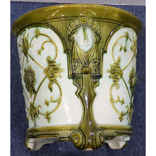 182 - A Wardle glazed earthenware jardiniere on cream and green ground with raised figurehead, fruit and s... 