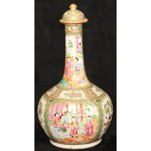 186 - A 19th Century Cantonese round bulbous thin necked bottle shaped lidded vase on white and green grou... 