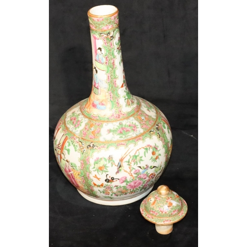 186 - A 19th Century Cantonese round bulbous thin necked bottle shaped lidded vase on white and green grou... 