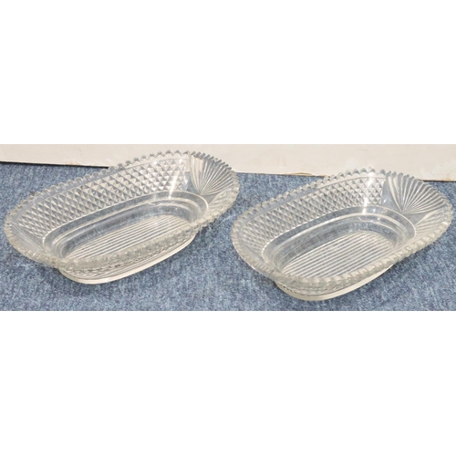 187 - A pair of Georgian cut glass oblong dishes with allover tooth cut decoration, 30cm wide