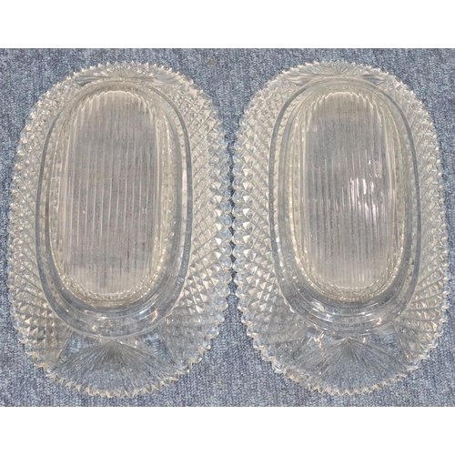 187 - A pair of Georgian cut glass oblong dishes with allover tooth cut decoration, 30cm wide