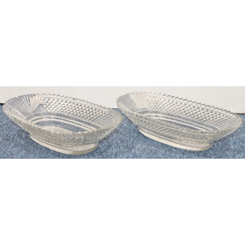 187 - A pair of Georgian cut glass oblong dishes with allover tooth cut decoration, 30cm wide