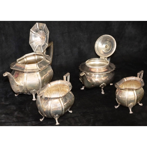 238 - A 3-piece oval bulbous shaped tea service on splayed feet, comprising of teapot, milk jug and 2-hand... 