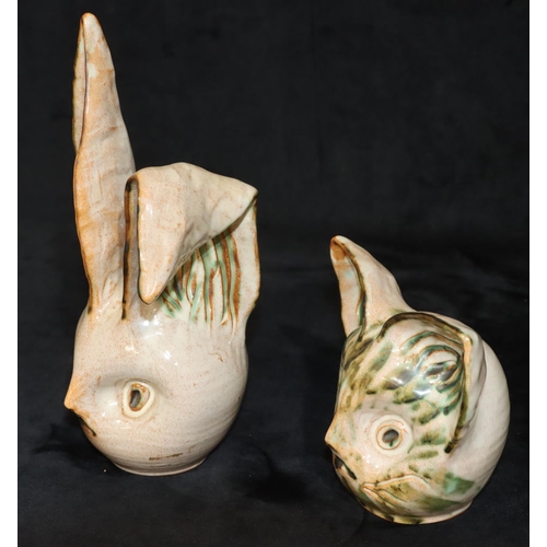 25 - Marc, Folkestone, glazed earthenware moneybox in the form of a hare, 24cm high (folded ear is glued ... 