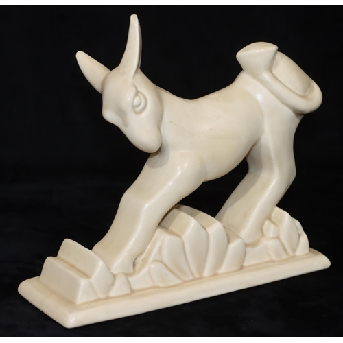 31 - A Beswick Art Deco figure of a donkey numbered 369, on cream ground, 20cm high (Slight nibbles to en... 