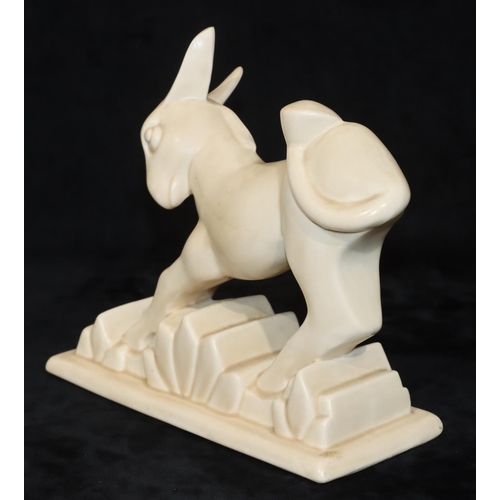 31 - A Beswick Art Deco figure of a donkey numbered 369, on cream ground, 20cm high (Slight nibbles to en... 