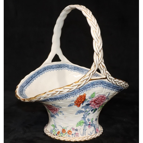 42 - A china basket shaped vase with inner frog block on white ground with multi-coloured floral, leaf an... 