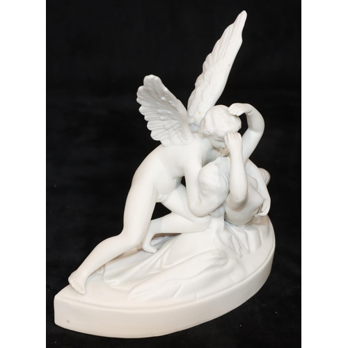 45 - A German Parian group, female nude supported by an Angel, on half round base, 19cm wide, 17cm high (... 