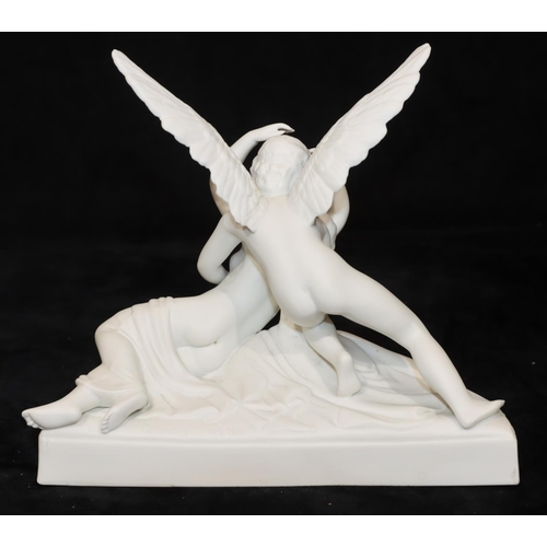 45 - A German Parian group, female nude supported by an Angel, on half round base, 19cm wide, 17cm high (... 