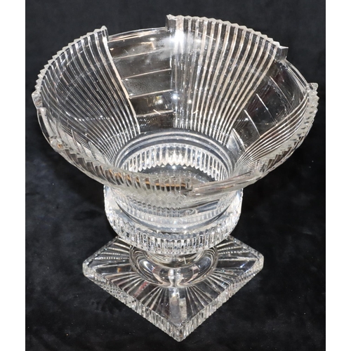 48 - A good quality heavy cut glass round trumpet shaped fruit bowl with allover tooth cut decoration, on... 