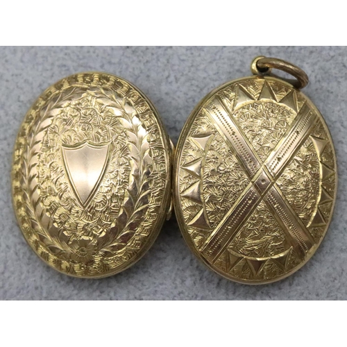 518 - An oval locket with allover chased decoration, 4cm high