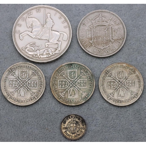 524 - A 1935 silver Crown, a 1959 half Crown, a 1928 One Florin, 2 1933 One Florin and a Threepence, 1940 ... 